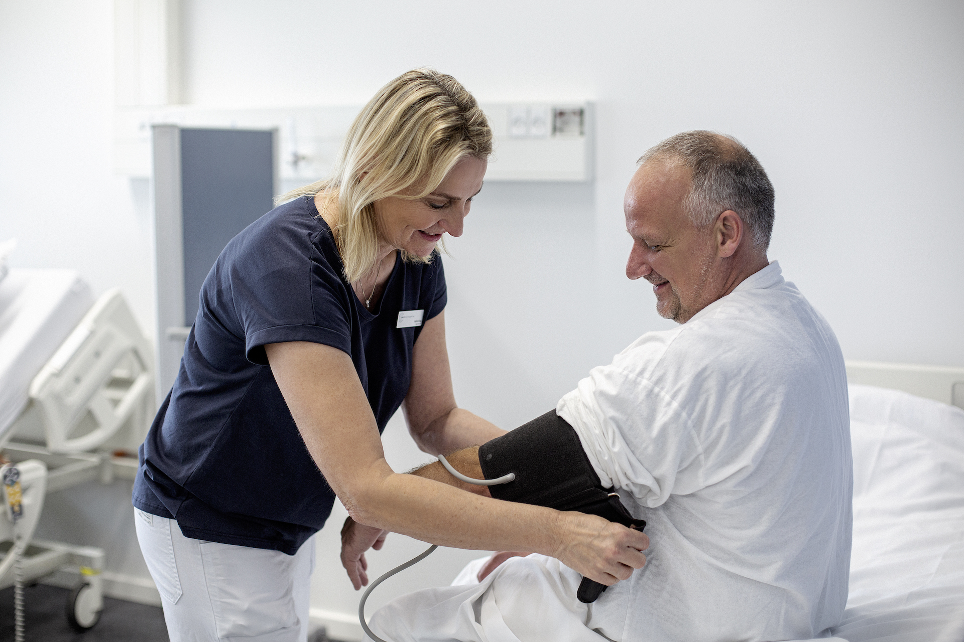 Pasient i konsultasjon med en erfaren lege hos CPH Privathospital